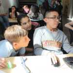 (left to right) Riley Taylor, Chelsea Johnson and Dan Distor work on a design for a mold to shape fungi into a brick of biodegradable insulation at the ANSEP Acceleration Academy. The team used a computer program to create a design to be 3D printed.