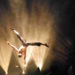 Andrey Moraru balances on one hand during Quixotic's performance in November 2012 at the Homer Mariner Theatre.