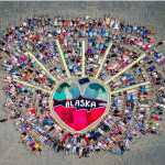 Hundreds of Salmonfest attendees became part of the art in the rodeo arena in August 2015. Homer artist Mavis Muller will return again this year to lead the 6th annual aerial group photo on Sat. Aug. 6 at 3 p.m.