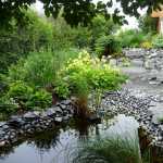 Water features add charm and music to a garden featured in a past garden tour. 