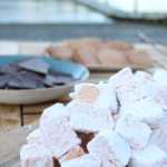 House-made salmonberry marshmallows accompany dark chocolate and house-made graham crackers to make s'mores for a bonfire on the beach at Tutka Bay Lodge.-Photo by Anna Frost, Homer News