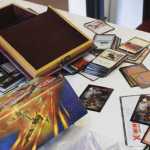 Magic: The Gathering cards scattered on one of the business's many playing tables.