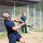 Beluga Lake Lodge player Chris Perk hits the ball while up at bat during the first game against Mean Machine for the Homer city league championship on Sunday, July 31.
