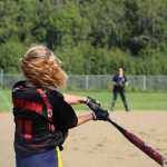 Mean Machine player Hannah Gordon swings at the ball during the second game for the Homer city league tournament championship on Sunday, July 31.
