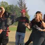 Mean Machine celebrates their victory over Beluga Lake Lodge after two games to win the championship title at the Homer city league softball tournament on Sunday, July 31.