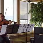 Andie Springer plays a piece called Fake Empire, originally by indie rock group, "The National," re-arranged by Homer's Conrad Winslow for violin and piano.