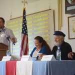 Moderator Chris Story, left, asks a question at the Homer Chamber of Commerce and Visitor Center debate on Tuesday at the Homer Elks Lodge. Homer Mayor Beth Wythe, Rep. Paul Seaton and John Cox wait their turns to answer.