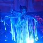 Photo by Megan Pacer/Peninsula Clarion A ballet dancer perfoms with Quixotic on Sunday, Aug. 7, 2016 at Salmonfest in Ninilchik, Alaska. Quixotic is a cirque nouveau that blends live music with dance, lights and other performance art.