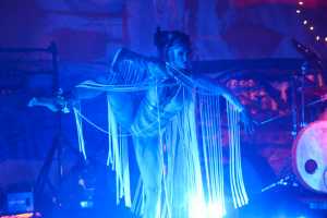 Photo by Megan Pacer/Peninsula Clarion A ballet dancer perfoms with Quixotic on Sunday, Aug. 7, 2016 at Salmonfest in Ninilchik, Alaska. Quixotic is a cirque nouveau that blends live music with dance, lights and other performance art.