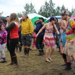 Festival-goers dance to The Inlaws and the Outlaws performance at Salmonfest's River Stage on Saturday, August 6.