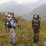 Doug and McKenzy Johnson hike back to camp with the Dall ram that McKenzy took down packed on their backs. McKenzy was able to shoot a Dall sheep on the Aug. 10 hunt and was the first person in her family to do so.