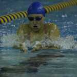 Homer Mariner Lauren Kuhns swims the breaststroke in the first heat of the girls 200-yard IM at the Homer Invite on Saturday, Sept. 10.