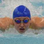 Photo by Joey Klecka/Peninsula Clarion Homer's Lauren Kuhns eyes the wall in the girls 50-yard butterfly event Friday at the SoHi Pentathlon in Soldotna. Kuhns ultimately finished third overall.