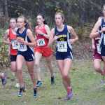 Photo by Jeff Helminiak/Peninsula Clarion Seward's Ruby Lindquist and Homer's Autumn Daigle, Audrey Rosencrans and Megan Pitzman pace the lead pack two kilometers into the Class 1-2-3A girls race at the Region III meet Saturday at Tsalteshi Trails. Pitzman, Rosencrans and Daigle went 1-2-3 to lead Homer to the girls crown.