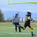 Noah Fisk scores a touchdown during the Homer vs. Redington homecoming game at Homer High School on Saturday, Sept. 24.