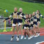 Homer High School's cheerleaders count out 50 jumping jacks in celebration of the Mariner's 50 points during the homecoming football game against Redington on Saturday, Sept. 24.