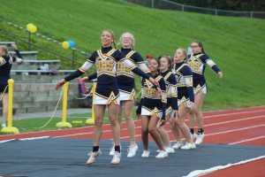 Homer High School's cheerleaders count out 50 jumping jacks in celebration of the Mariner's 50 points during the homecoming football game against Redington on Saturday, Sept. 24.