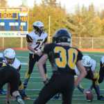 Sean Love gets ready to receive the ball at the edge of the Mariners' end zone with two seconds left on the clock in Homer's game against Voznesenka on Friday, Sept. 30. Homer High's team was the guest team, and beat Voznesenka 48-7.