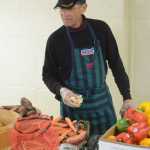 Michael E. Gradney Jr. works at the Homer Food Pantry on Sept. 26 at Homer United Methodist Church.