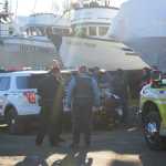 Homer Volunteer Fire Department medics move Paul Suter, 30, in a stretcher to an ambulance after treating him for a head injury following a crash at the Northern Enterprises Boat Yard. Suter is accused of evading troopers in a high-speed chase from Anchor Point to Homer that ended when he crashed a truck he stole.