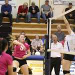 Mary Hana Bowe spikes the ball past a Cordova player during the Mariner home game on Thursday, Oct. 6.