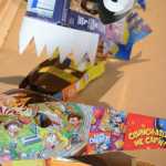 Some of the recycled box masks made by Claudio Orso-Giacone in a workshop at Bunnell Street Arts Center last month.