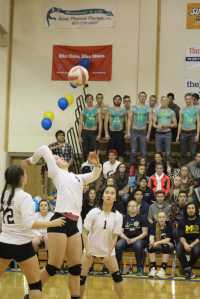 Mary Hana Bowe extends her arm backward to hit the ball across the net during the Mariners' game against Houston on Friday, Oct. 14.