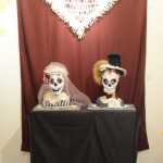 Colleen Clifford's "The Bride," left, and "El Padron," right, are displayed in front of Desiree Hagen's "Arbol de la Esperanza."