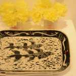 Jeff Szarzi's platter of murres was inspired by the die-off earlier this year of thousands of murres in Alaska.