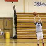 Uliana Reutov shoots the ball during practice on Dec. 6. The girls basketball team trained during the off-season with open gyms in the summer and fall so as to prepare for the season.