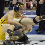 Photo by Joey Klecka/Peninsula Clarion Homer senior Timmy Woo battles with Glennallen's Caden Gerlach in the 160-pound final of the Class 1-2-3A state wrestling championships Saturday night at the Alaska Airlines Center in Anchorage.