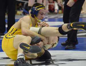 Photo by Joey Klecka/Peninsula Clarion Homer senior Timmy Woo battles with Glennallen's Caden Gerlach in the 160-pound final of the Class 1-2-3A state wrestling championships Saturday night at the Alaska Airlines Center in Anchorage.