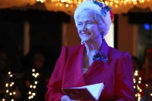 RoseMarie Daily checks her naughty and nice list dressed as Mrs. Claus at the Homer Senior Citizens fashion show in November.-Photo by Anna Frost, Homer News