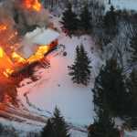 Daniel Bunker took these photos while flying over a house fire on Deep Creek.