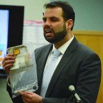 Defense attorney Adam Franklin holds the utility knife found next to Demian Sagerser after he was shot by Demarqus Green. In closing arguments, Franklin claimed Sagerser attacked Green with the knife and Green shot him in self defense.-Photo by Michael Armstrong, Homer News