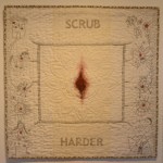 In “Girl Story #2,” Meissner’s children drew on the work with temporary marker that she later embroidered over.-Photo by Michael Armstrong, Homer News