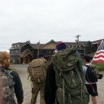Members of the Alaskan Warrior Class Community do a 6-mile ruck march on East End Road in June.