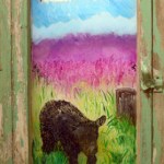Tomich’s “Little Bear” is painted on a glass window.