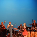 Homer High School senior Carly McLean plays a clarinet solo with Pink Martini. McLean and fellow senior Miles Catlin were chosen to perform with the band.-Photo by Annie Rosenthal, Homer News