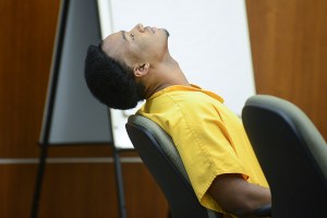Demarqus Green reacts after Kenai Superior Court Judge Anna Moran decided to reschedule his sentencing hearing on Nov. 13 at the Kenai Courthouse to 2:15 p.m. Dec. 28 at the Homer Courthouse.-Photo by Rashah McChesney, Morris News Service/Peninsula Clarion