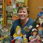 Jill Hockema sits at her booth, Forget Me Not Quilting and Crafts, at the Black Friday Holiday Faire at the Kachemak Community Center.