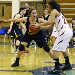 Aurora Waclawski, a senior Mariner, blocks a Mount Edgecumbe player from passing the ball during the Friday, Jan. 8 game in Homer High School’s gym.-photo by Anna Frost, Homer News