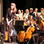 Kenai Peninsula Orchestra Conductor Tammy Vollum-Matturo makes a face during the Link Up concert in Homer on Jan. 15.-photo by Anna Frost