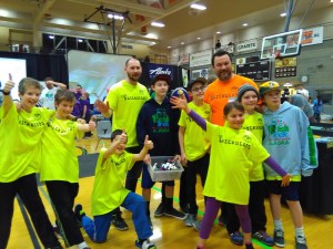 The West Homer Elementary School Brickheads celebrate at the Lego Robotics Tournament in Anchorage last weekend. The team won the Homer tournament and placed 28th — but won first place for Core Values, the teamwork award. From left to right are Seamus and Theo McDonough, Casey Anderson,  assistant coach Jonah Brost, Aiden Brost, Ryan Carroll, Victor Romanko, coach Zach Miller, Cecilia Fitzpatrick, Thatcher Lowney and Eric Marshall.  Not pictured is Rayna Lowther.  -Photo by Erica Fitzpatrick