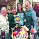 Homer Farmers Market board member Lori Jenkins, manager Robbi Mixon and avid market supporter Kyra Wagner meet Van Corum, author of “The New Farmers Market,” at the Washington State Farmers Market Association Conference in February when Mixon won a prize package that included the new second edition of the book.-Photo provided