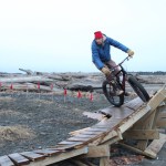 Forrest Janukajtis rounds a slanted ramp on the Big Fat Bike Festival obstacle course at the Friday, March 11 bonfire. Janukajtis come down from Anchorage to participate in the festival with his family.-Photo by Anna Frost, Homer News