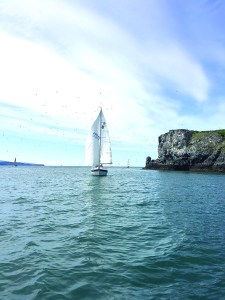 The Martha J, navigated by Captain Carlin Rauch, sails around Gull Island during the Homer Yacht Club’s Cheechako Cup race on Saturday, May 14.-Photo by Willow Hetrick