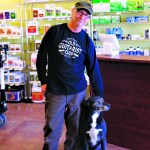 Panama Reds owner Carl Sanche and his shop dog Shae opened the Homer store in late May. Sanche also maintains his first store location in Kenai.-Photo by Anna Frost, Homer News