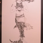 What artist Felicity Jones calls "doodles" or sketches within her drawings, inspire a closer look. She provided magnifying glasses at her exhibit so people could look at the doodles closer.