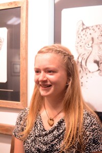 Felicity Jones poses for a photo at the First Friday opening of her exhibit at the Homer Council on the Arts, "Windows."-Photo by Michael Armstrong, Homer News